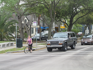 Cyclists and motorists share the road on Heights Blvd at 11th Street.